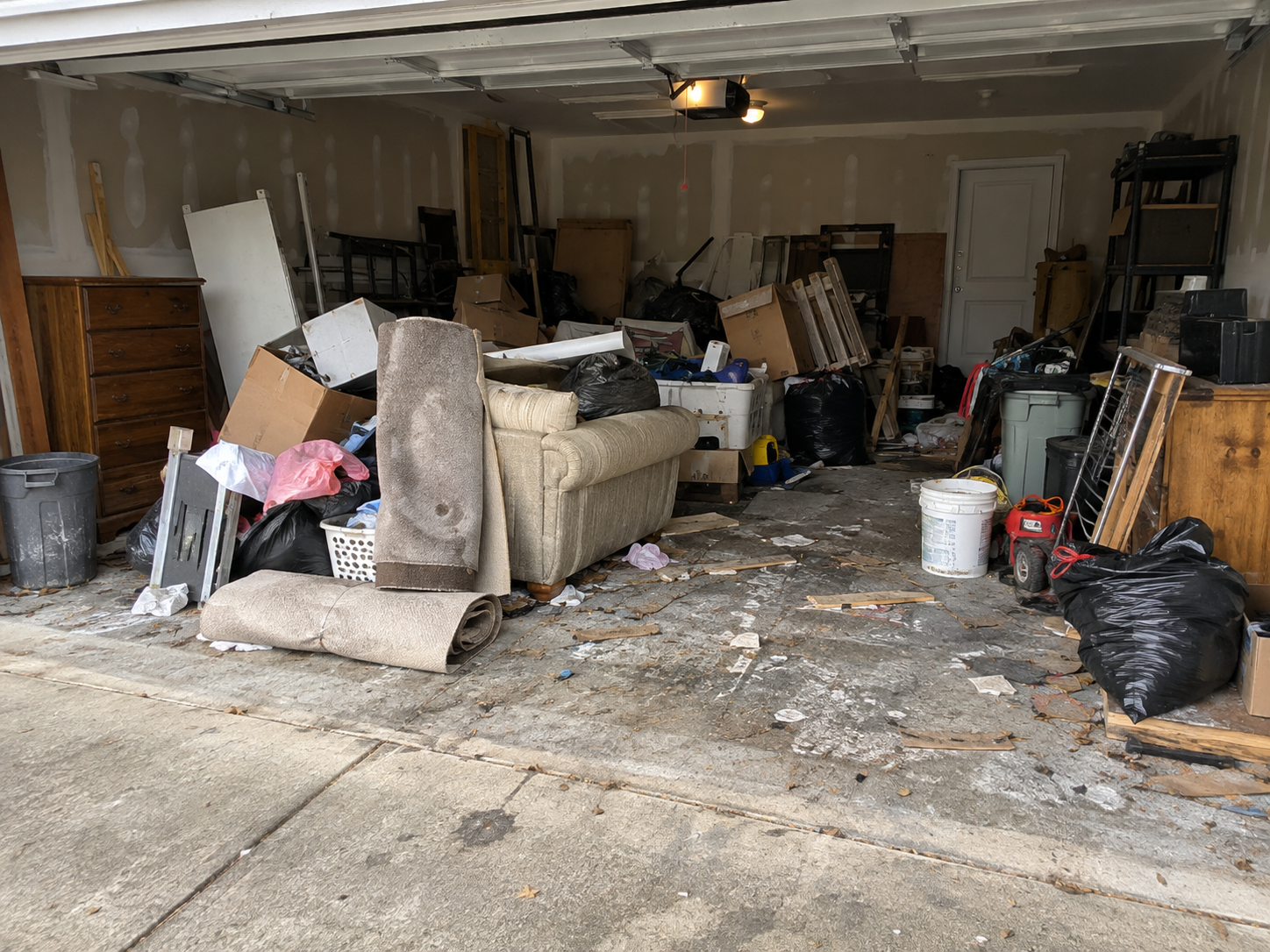 Sample photo of a cluttered garage before cleanout